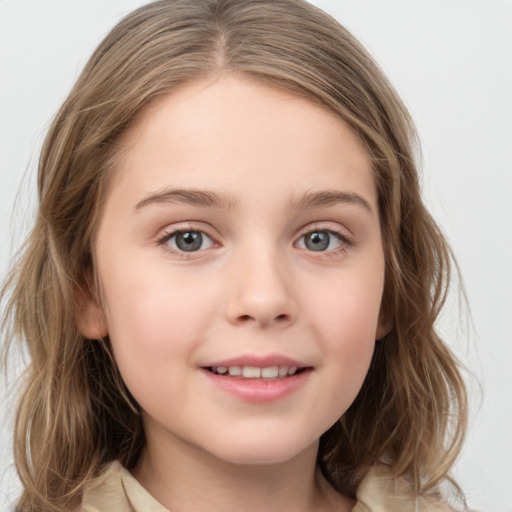 Joyful white child female with medium  brown hair and grey eyes