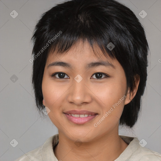 Joyful asian young-adult female with medium  black hair and brown eyes