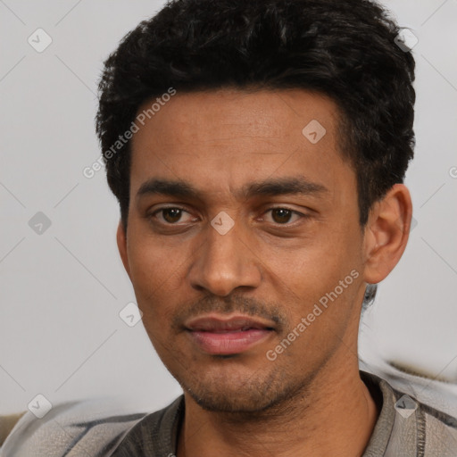 Neutral latino adult male with short  black hair and brown eyes