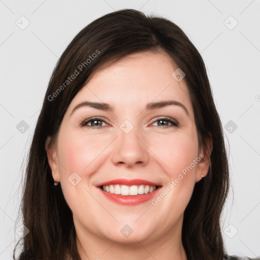 Joyful white young-adult female with long  brown hair and grey eyes