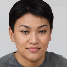 Joyful asian young-adult female with short  brown hair and brown eyes