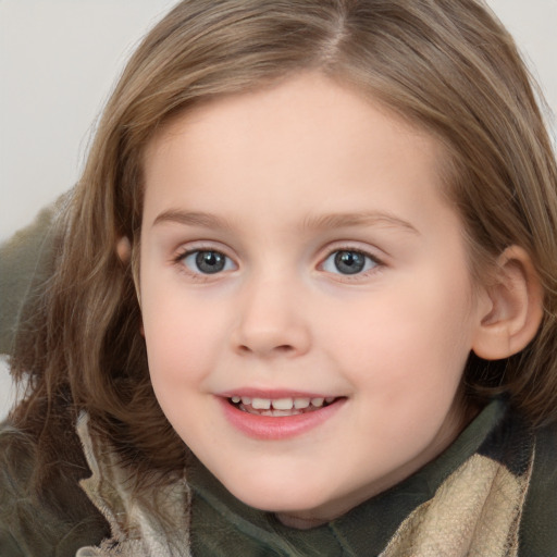 Joyful white child female with medium  brown hair and grey eyes