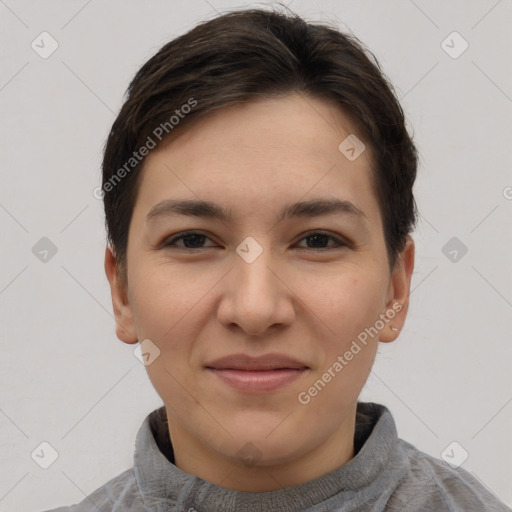 Joyful white young-adult female with short  brown hair and brown eyes