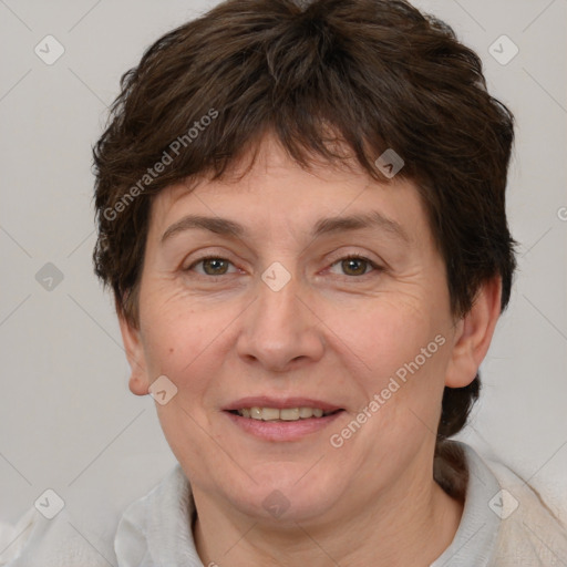 Joyful white adult female with short  brown hair and brown eyes