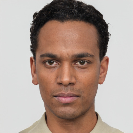 Neutral black young-adult male with short  black hair and brown eyes