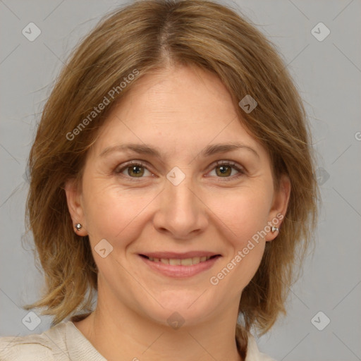 Joyful white adult female with medium  brown hair and grey eyes