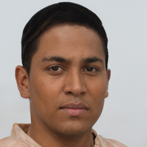 Neutral latino young-adult male with short  brown hair and brown eyes