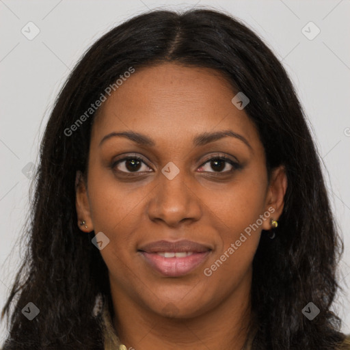 Joyful black young-adult female with long  brown hair and brown eyes