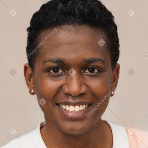 Joyful black young-adult female with short  brown hair and brown eyes