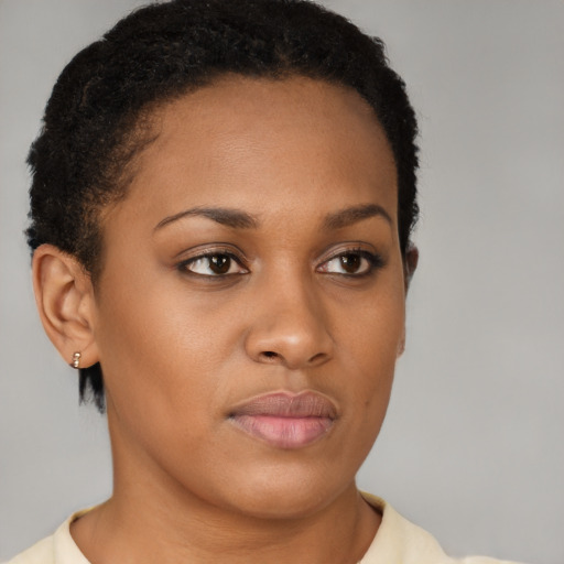 Neutral black young-adult female with short  brown hair and brown eyes