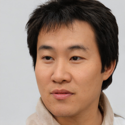 Neutral asian young-adult male with short  brown hair and brown eyes