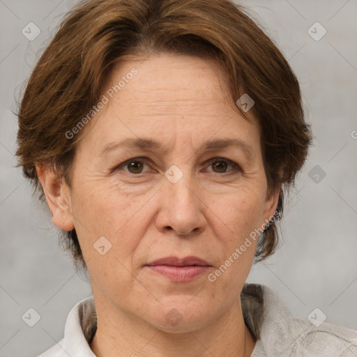 Joyful white middle-aged female with short  brown hair and brown eyes