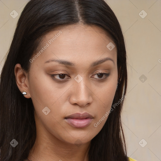 Joyful asian young-adult female with long  brown hair and brown eyes