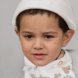 Joyful white child female with short  brown hair and brown eyes