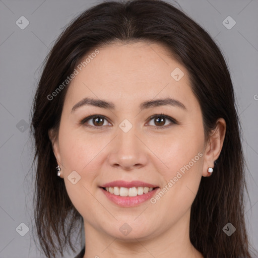 Joyful white young-adult female with medium  brown hair and brown eyes