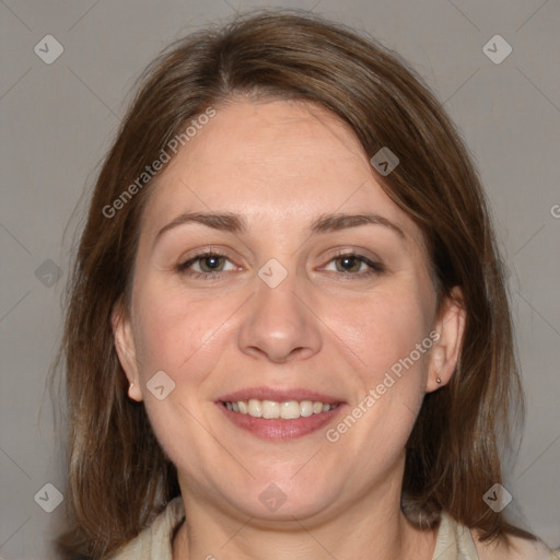 Joyful white adult female with medium  brown hair and grey eyes