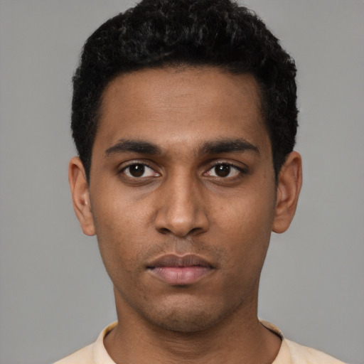 Neutral black young-adult male with short  black hair and brown eyes