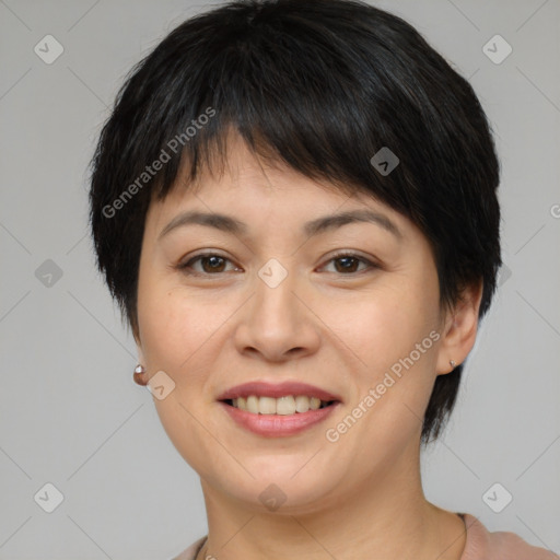 Joyful asian young-adult female with short  brown hair and brown eyes