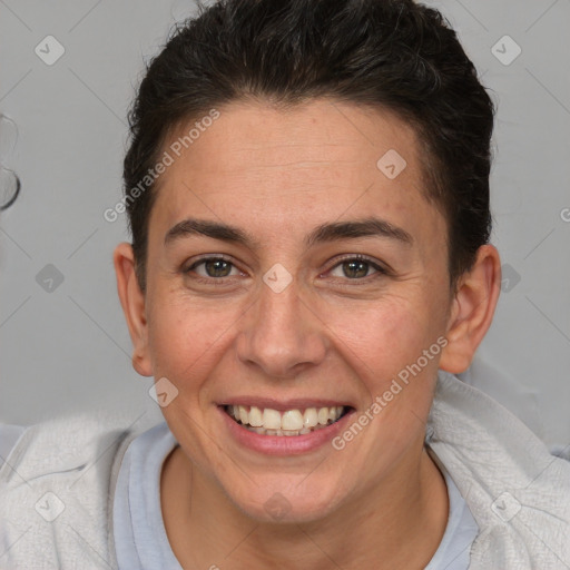 Joyful white adult female with short  brown hair and brown eyes