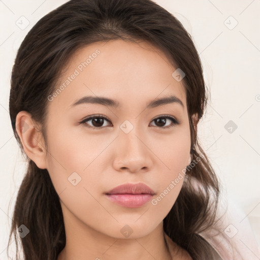 Neutral white young-adult female with long  brown hair and brown eyes