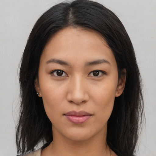 Neutral asian young-adult female with long  brown hair and brown eyes