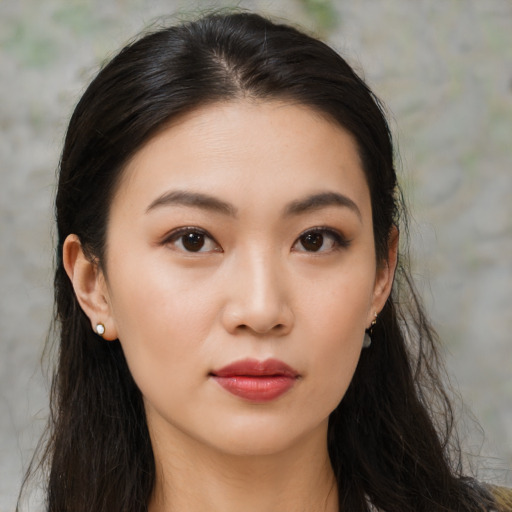Neutral asian young-adult female with medium  brown hair and brown eyes