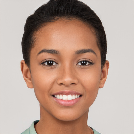 Joyful latino young-adult female with short  brown hair and brown eyes