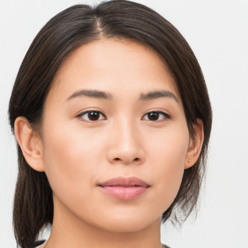 Neutral asian young-adult female with medium  brown hair and brown eyes