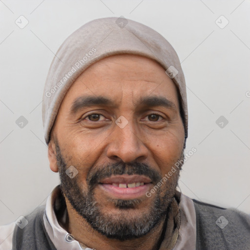 Joyful white adult male with short  black hair and brown eyes