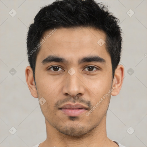 Neutral latino young-adult male with short  black hair and brown eyes