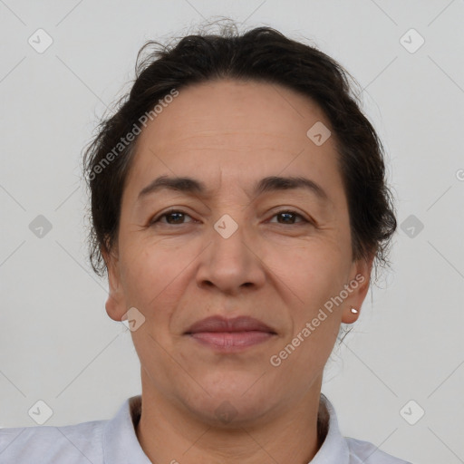 Joyful white adult female with short  brown hair and brown eyes