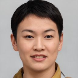 Joyful asian young-adult female with short  brown hair and brown eyes