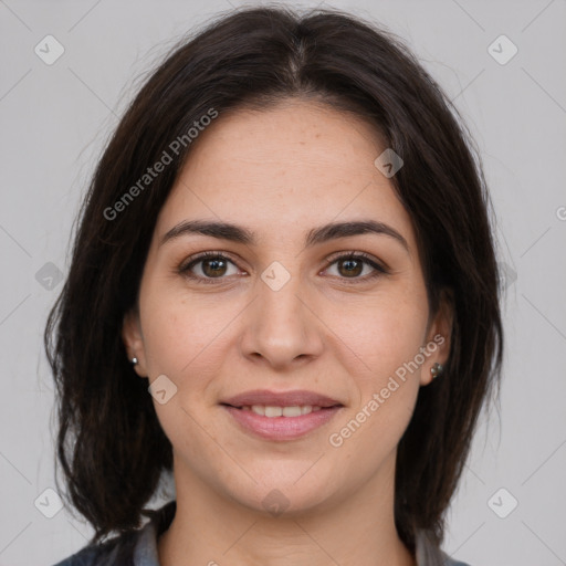 Joyful white young-adult female with medium  brown hair and brown eyes