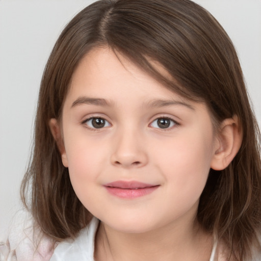 Joyful white child female with medium  brown hair and brown eyes