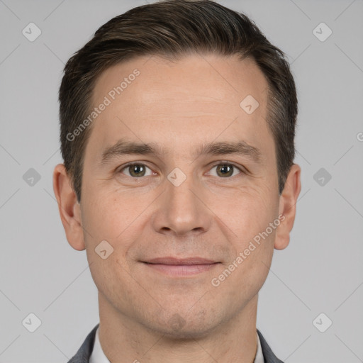 Joyful white adult male with short  brown hair and brown eyes