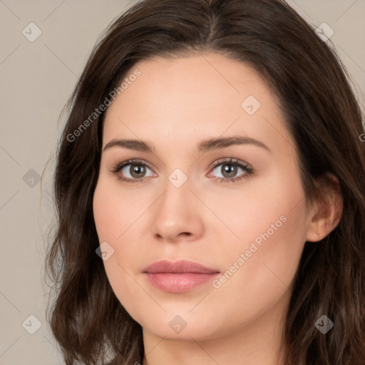 Neutral white young-adult female with long  brown hair and brown eyes