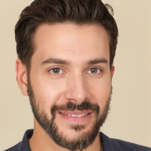 Joyful white young-adult male with short  brown hair and brown eyes