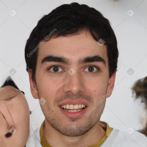 Joyful white young-adult male with short  black hair and brown eyes