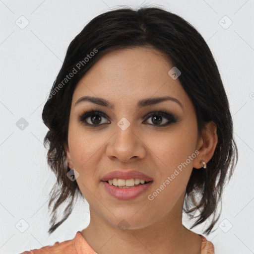 Joyful latino young-adult female with medium  brown hair and brown eyes