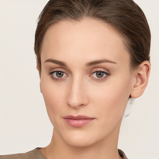 Neutral white young-adult female with short  brown hair and brown eyes