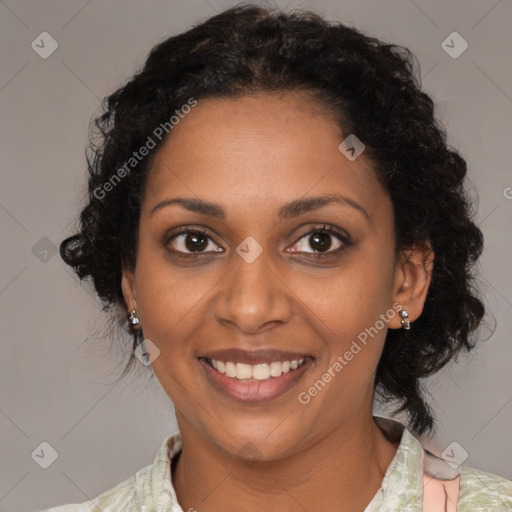 Joyful black young-adult female with medium  black hair and brown eyes