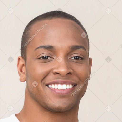 Joyful black young-adult male with short  brown hair and brown eyes