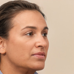 Neutral white young-adult female with short  brown hair and brown eyes