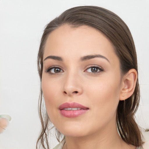 Neutral white young-adult female with medium  brown hair and brown eyes