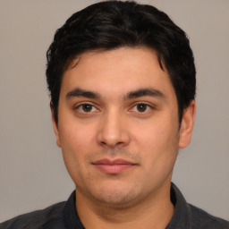 Neutral white young-adult male with short  black hair and brown eyes