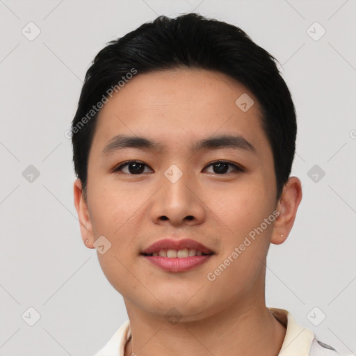 Joyful asian young-adult male with short  black hair and brown eyes