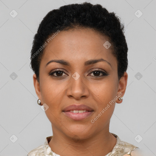 Joyful black young-adult female with short  brown hair and brown eyes