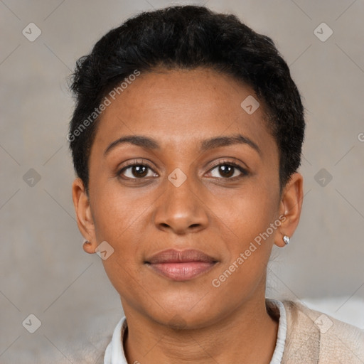 Joyful black young-adult female with short  brown hair and brown eyes