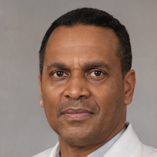 Neutral latino adult male with short  black hair and brown eyes