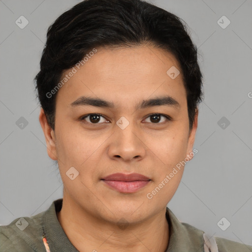 Joyful asian young-adult male with short  brown hair and brown eyes